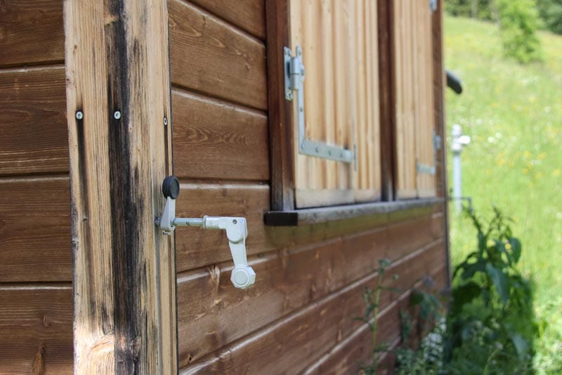 Simple shutter dog installed to hold shutters open.