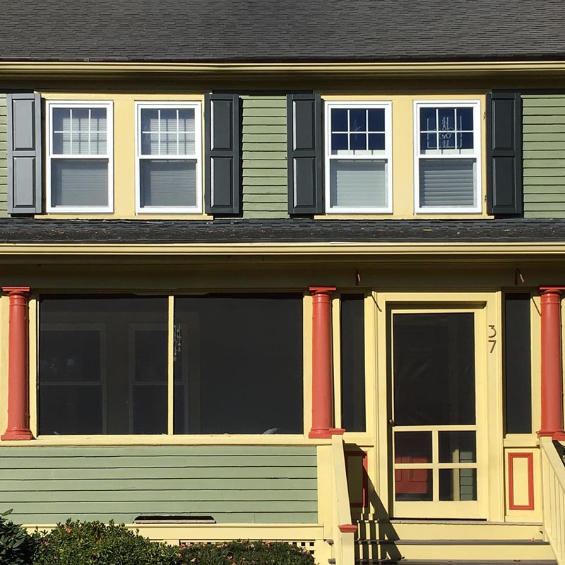 Raised panel composite shutters for outside windows on green house.