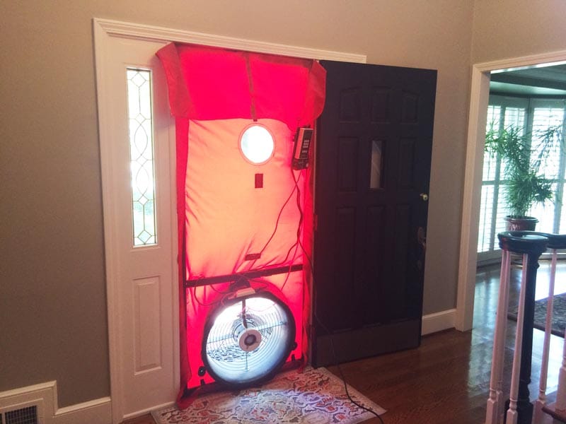 Blower door test to audit air leaks.