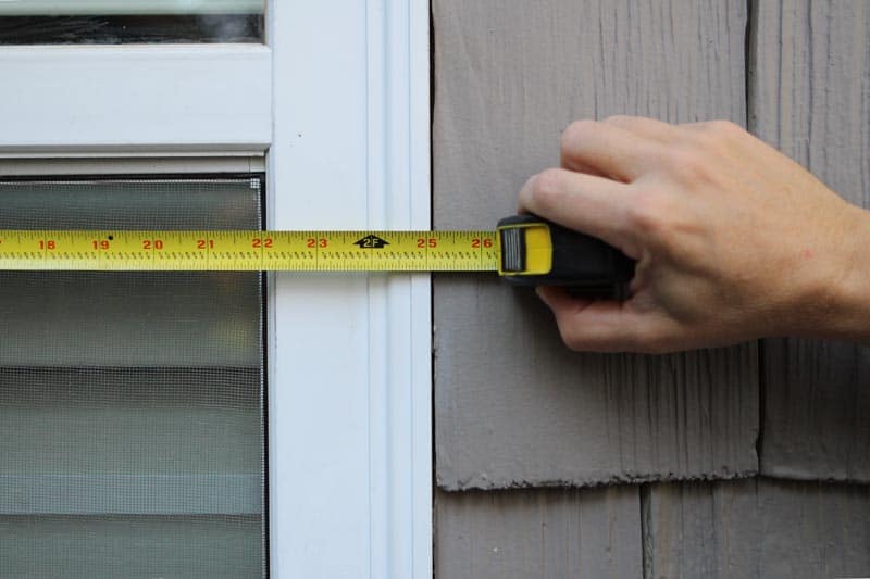 Measure windows for exterior vinyl shutters.