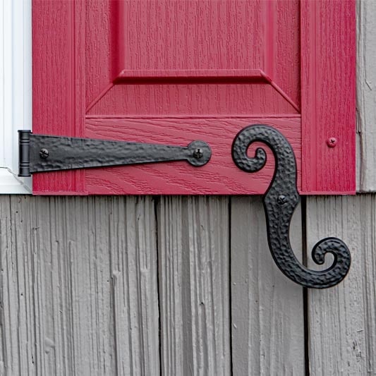 Exterior vinyl faux hardware including hinge and dogs.