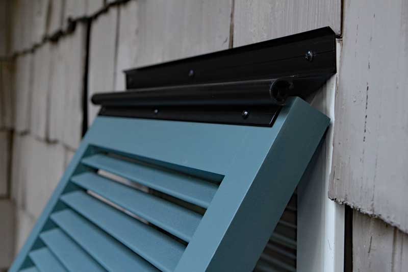 Outdoor Bahama shutter top mounted hinge.