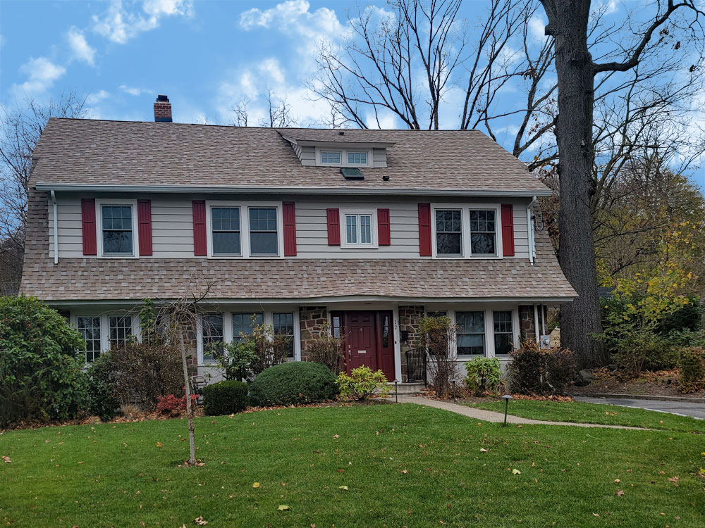 Composite groove panel shaker style exterior shutters.