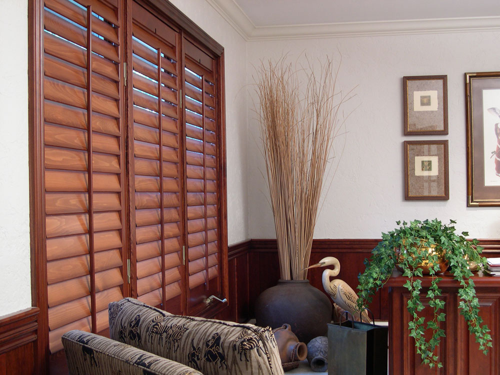 Wood plantation interior shutters that provides light control and insulation.