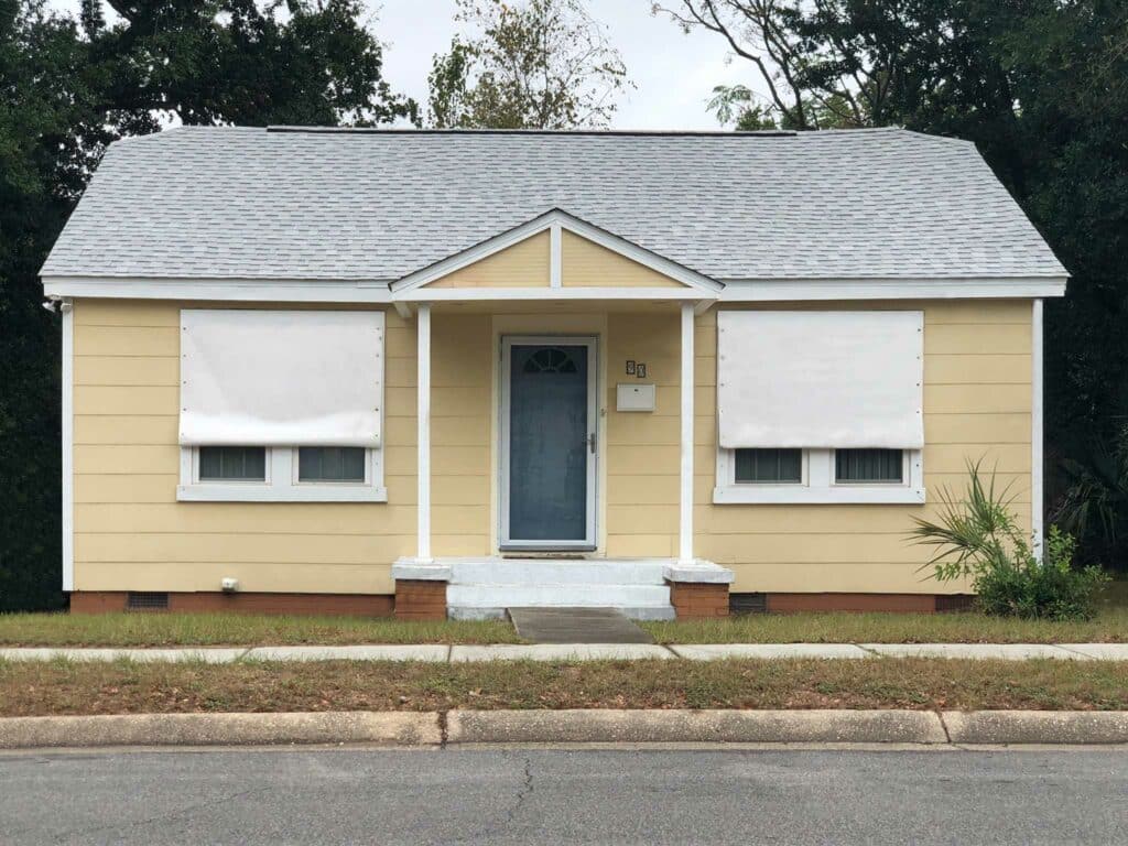 Hurricane fabric used to protect coastal windows in tropical storms.