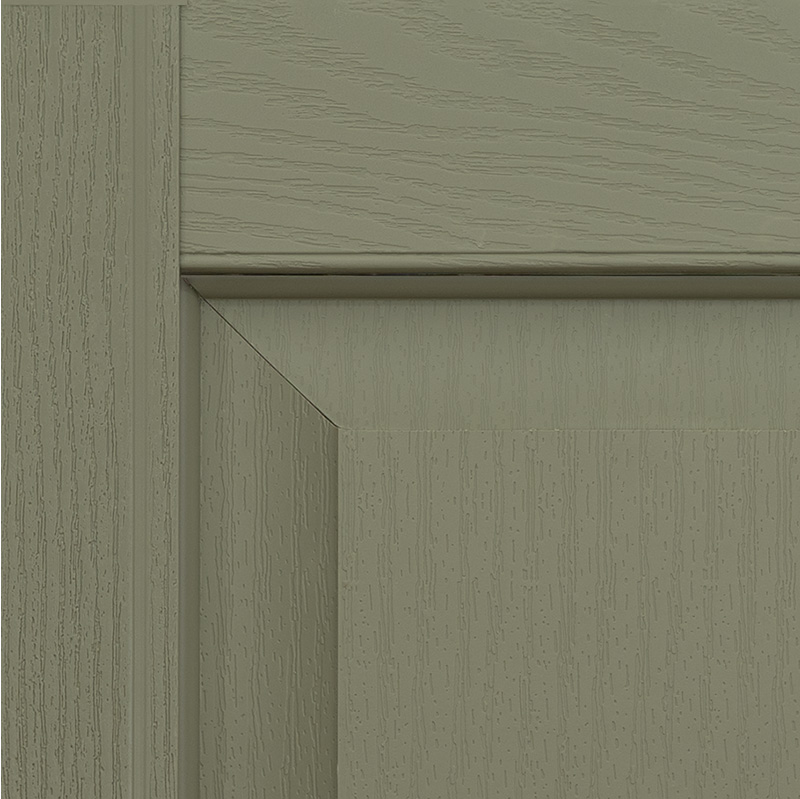 Raised panel vinyl exterior shutters in sage green-close up view.