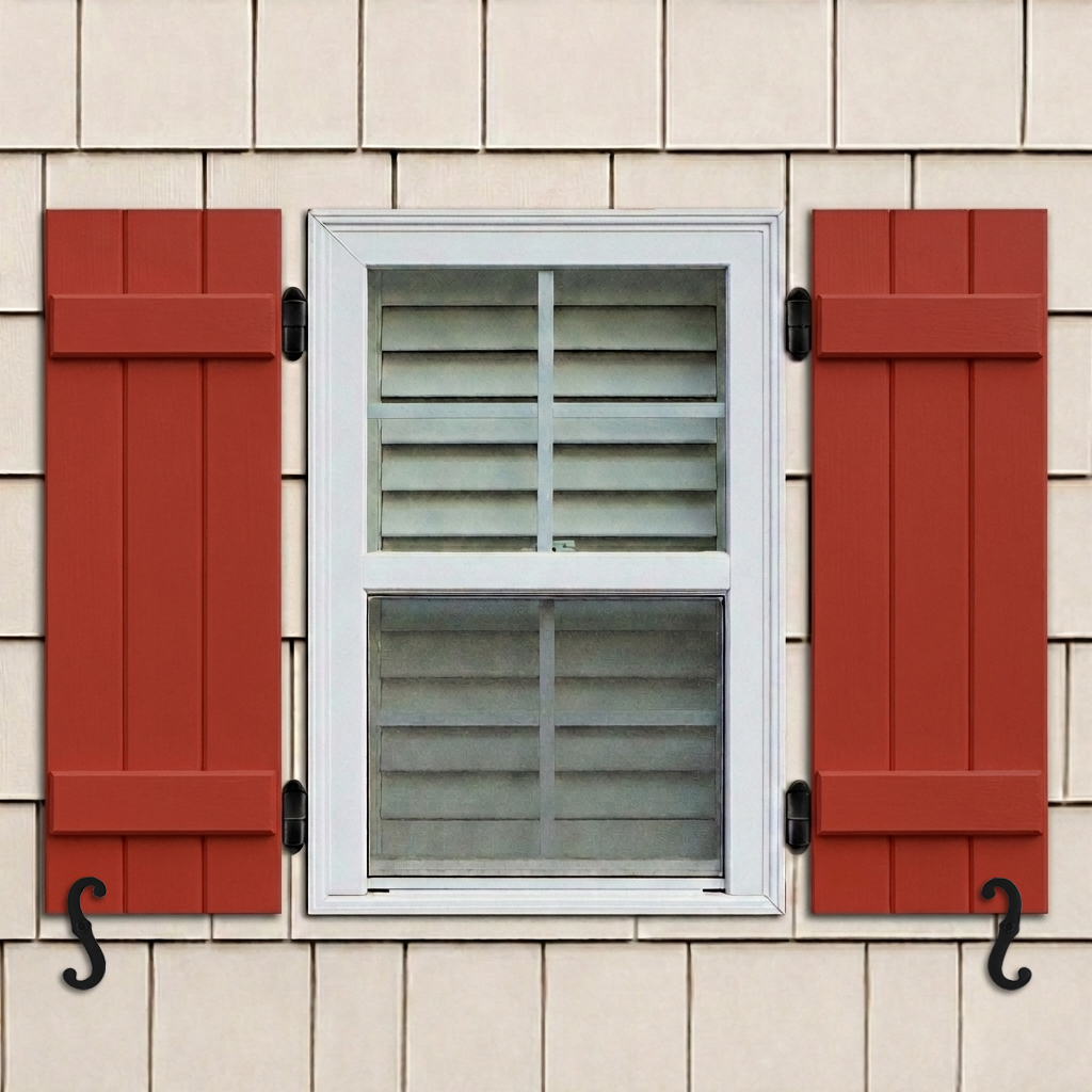 Pine board and batten exterior shutters installed on a window with functional hinges.